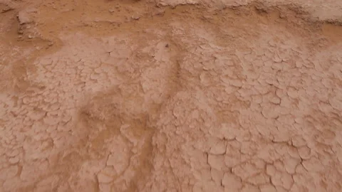 High angle POV walk on dry land in Sahara desert 스톡 동영상 89661125