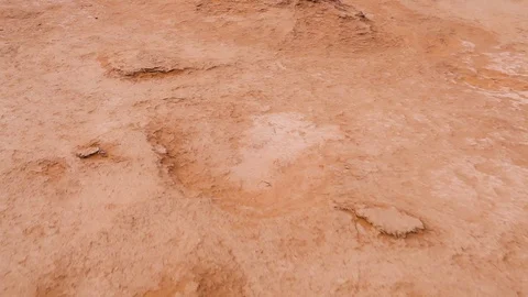 High angle POV walk on dry land and sand dunes in Sahara desert 스톡 동영상 129777928