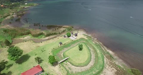 HIGH ANGLE R2L PANNING SHOT OF AREA NEAR PURA ULUN DANU BERATAN TEMPLE Stock Footage 59853405