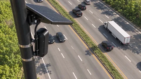 High Angle Rear View of Roadside Camera Above Highway Traffic Vídeos de archivo 346407206