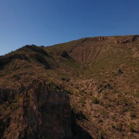 High Angle Reverse Aerial Flyover Establishing Shot of the Arizona Desert Stock Footage
