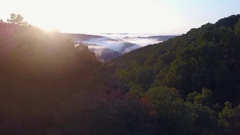 High angle scene of stunning sunshine landscape at misty mountains Stock Footage 81772678