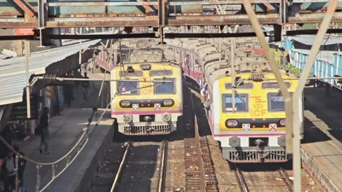 High angle shot of 2 Mumbai Local Trains arriving on a station Stock Footage 157381379