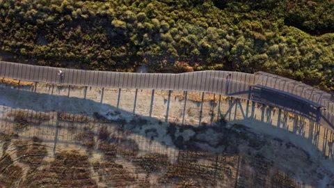 High angle shot of a barrier dividing natural landscapes Stock Footage 345225707