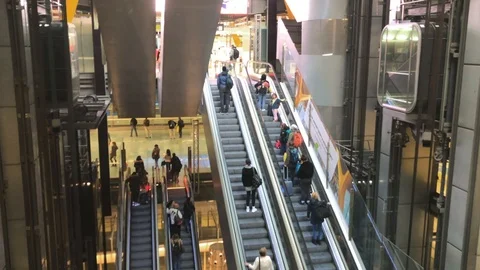 High angle shot of big escalators and elevators in Madrid airport. Stock Footage 104798457