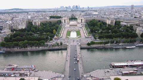 High angle shot of a big park in Paris, France with lush greenery and a bridge Stock Footage 158604821