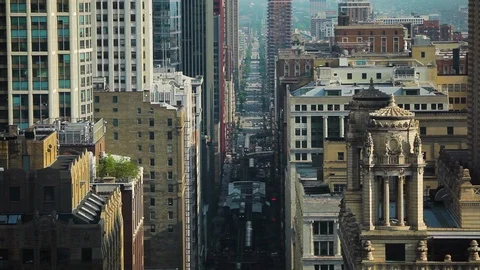 High angle shot of buildings and traffic on the streets of Chicago Stock Footage 97101524