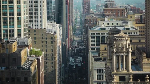 High angle shot of buildings and traffic on the streets of Chicago Stock Footage 97101546