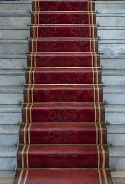This high-angle shot captures a stone staircase featuring white marble trea.. Stock Photos