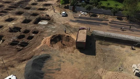 High Angle Shot of Construction Crew and Dump Truck at Building Project. Vidéo 339097735