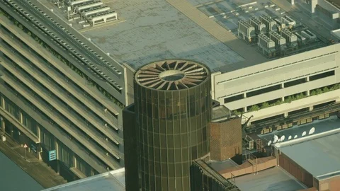 High angle shot of a cylindrical glass feature on a building Stock Footage 79661901
