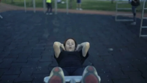 High angle shot of a determined woman exercising Stock Footage 80946949