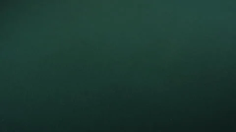 High angle shot of face up deck of cards being thrown on green felt table Stock Footage 53240567