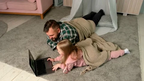 High angle shot of Father and Daughter having video call with mother Stock Footage 161836173