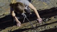 High Angle Shot Of Female Rock Climber Climbing Up (Toward Camera, Slow Motion) Stock Footage