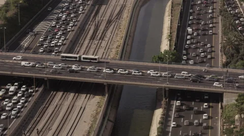 High Angle shot of HaHalacha Bridge over the Ayalon River &amp; freeway. Stock Footage 55283728