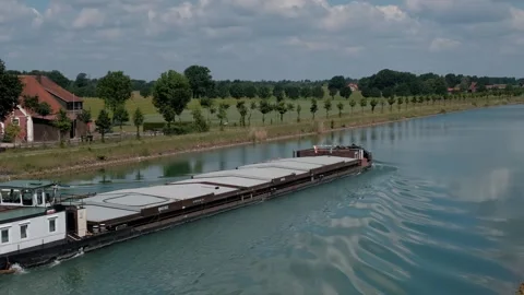 High angle shot of a large freight barge on a canal Vidéo 337291887