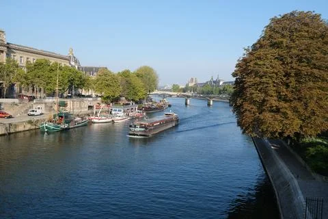 High angle shot of a large ship sailing on the Seine River in Paris, France Stock Photos