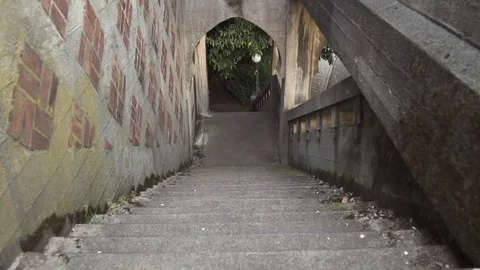 High-angle shot of man running up stairs 스톡 동영상 76541157