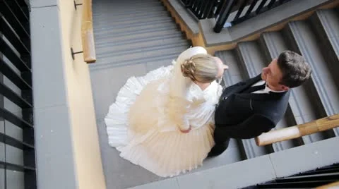 High angle shot of a married couple speaking on the stairs Stock-Footage 20471032