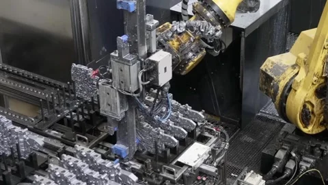 High-angle shot of a multi-axis robotic arm precision-sorting and placing Stockbeeldmateriaal 332917927