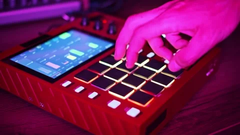 High-Angle Shot of Musician Using Digital Drum Machine Stock Footage 313080173