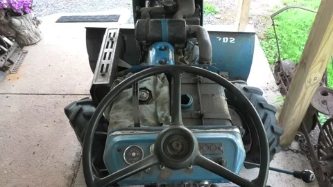 A High Angle Shot of a Person Ready to Add Diesel Fuel in a Tractor Stock Footage 156965794