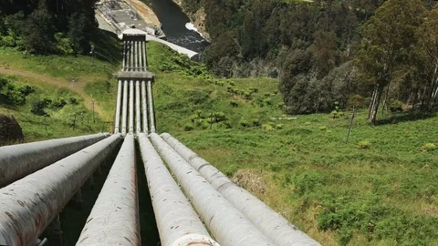High angle shot of pipes supplying the power station at tarraleah Stock Footage 73501176
