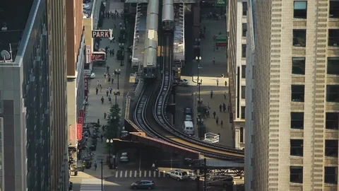 High angle shot of railway station amidst city buildings in Chicago Stock Footage 97101637