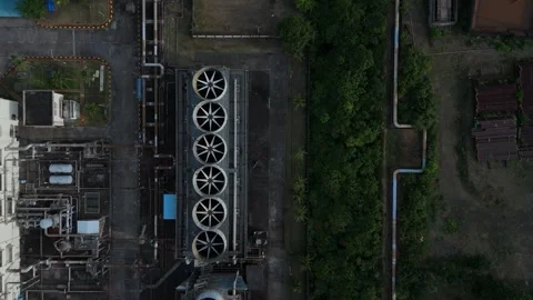 High-angle shot reveals geothermal power plants industrial cooling towers. Stock Footage 336737405
