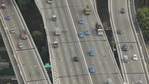 High angle shot of traffic on a bridge over a river Stock Footage 97103197