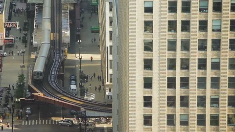 High angle shot of two trains passing each other in Chicago Stock Footage 97101326