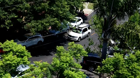 High Angle Side Street View of Cars Passing Video stock 32245382