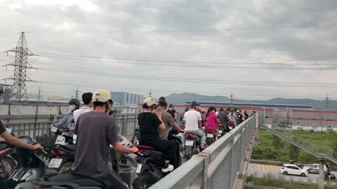 High angle side view of motorbike traffic on an overpass bridge. Stock-Footage 344142887