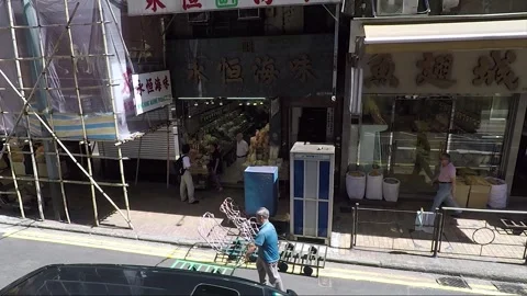 High Angle Side View, Vehicle Shot, Chinese Shops, Sheung Wan, Hong Kong Stock Footage 259959743