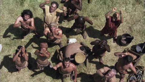 High angle of slaves looking upward and applauding - Reenactment Stock Footage 202914628