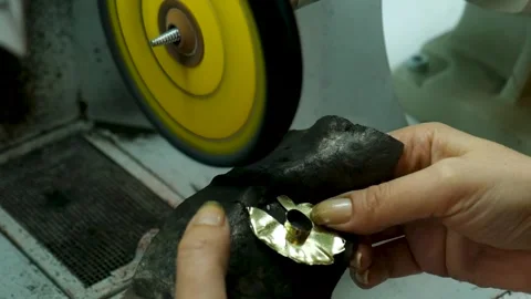 High Angle Slow Motion Close Up of Jewelry Polishing and Hand Finishing Stock Footage 327863766
