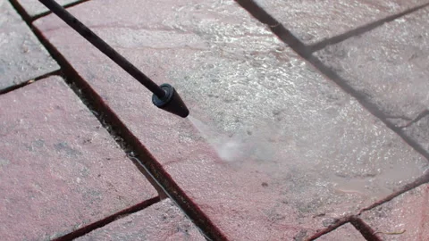High angle slow motion shot of cleaning terrace stones of plat. Spring Vídeos de archivo 242070690