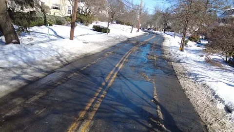 HIGH ANGLE SLUSHY ROAD Video stock 194496796