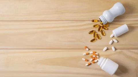 High angle spoon with different pills Stock Photos