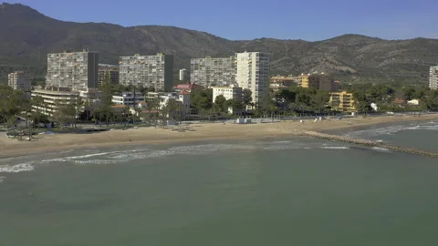 High angle Static drone shot over sea facing seaside town Stock-Footage 150406040