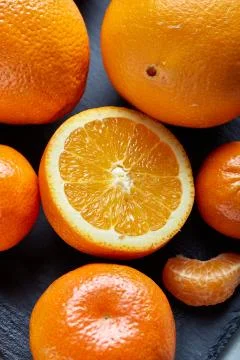 High angle still life view of sliced ruby orange and tangerine arranged together 写真素材