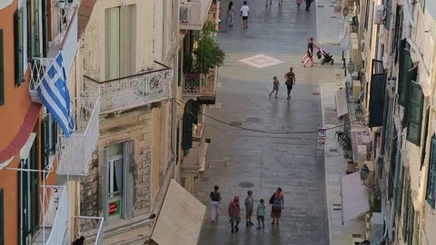 High-angle street perspective looking down the pedestrian corridor of Agion Stock Footage 344015638