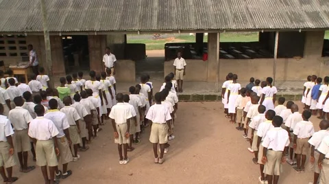 HIGH ANGLE STUDENTS SING AT MORNING ASSEMBLY Stock Footage 60627588