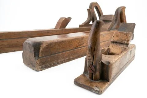 High angle studio shot of three vintage wood planers of different sizes Stock Photos