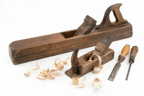 High angle studio shot of two vintage wood planers and chisels of different Photos