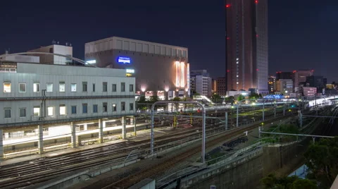 High angle time lapse looking South from Shinjuku station at night Stock Footage 49909645