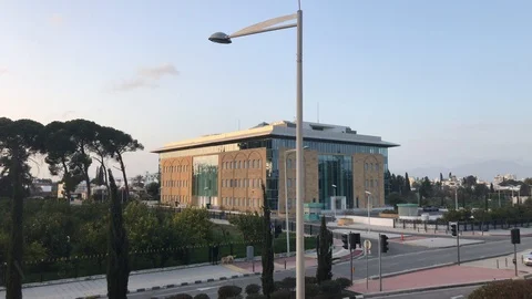 High Angle Time Lapse Shot of Cars Pass by Modern Building. Business Building Stock Footage 101795441