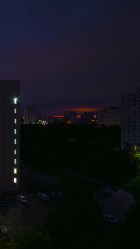 High angle time lapse of vibrant sunrise transition over urban residential .. Video stock 346145991