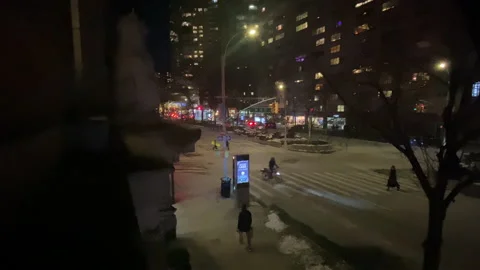 High Angle Timelapse view: Bustling Manhattan city traffic continues at night Stock Footage 196263092